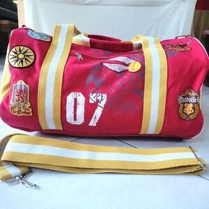 Gryffindor Red Duffel Bag. Red w/ Patches. 18 x 11 x 11 Inches